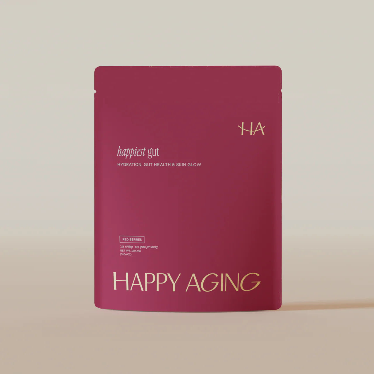 Pink package labeled 'Happy Aging' on a beige background