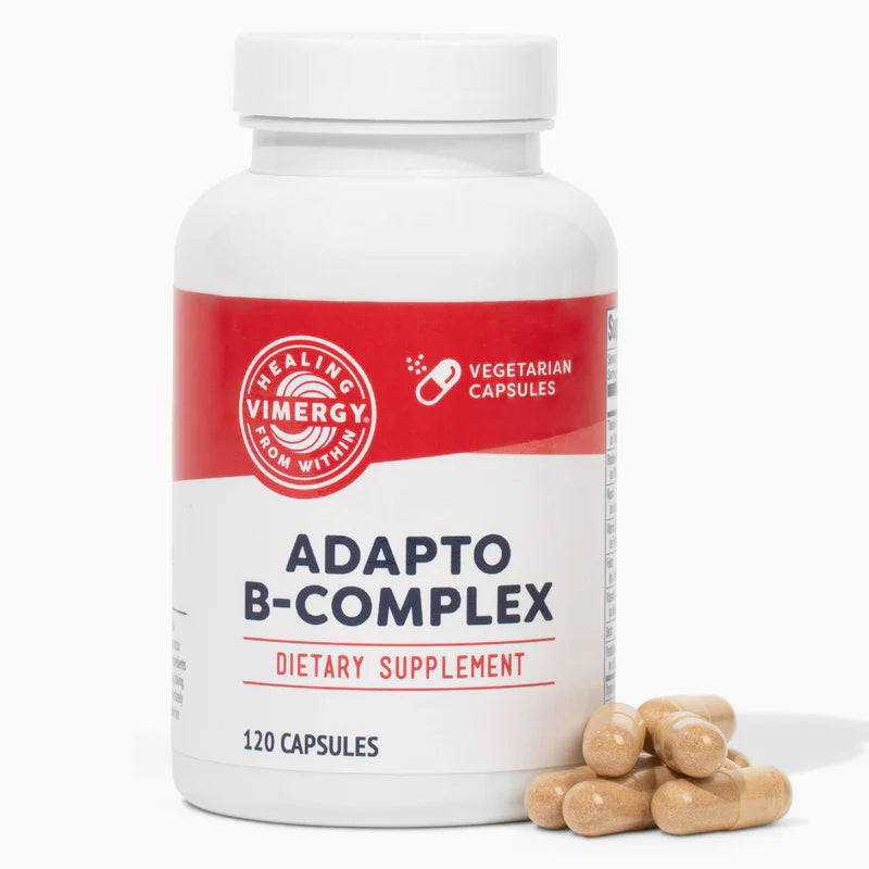 Supplement bottle labeled 'Adapto B-Complex' with a red label on a white background
