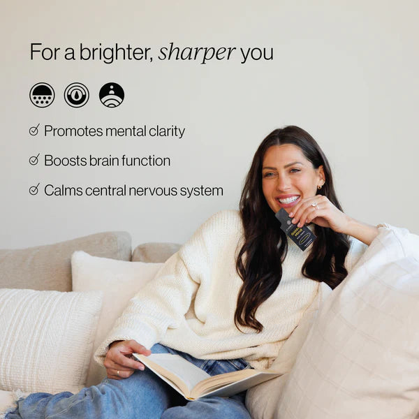 Golden Mind | 30 pouches: woman enjoying mental clarity and brain function benefits, promoting central nervous system health.
