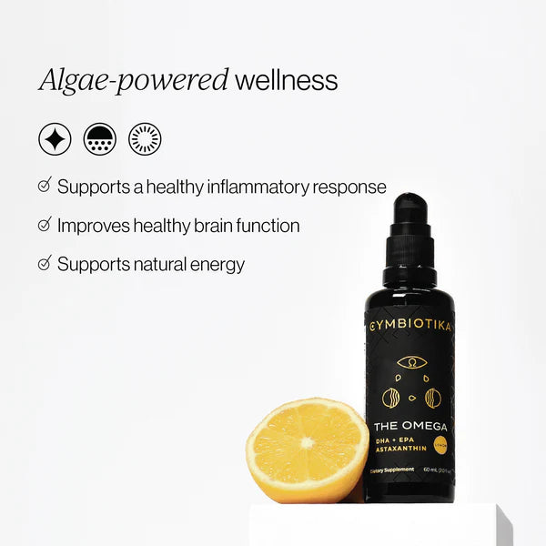 Bottle of EYMBIOTIKA The Omega supplement with a lemon on a white background, featuring text about algae-powered wellness.