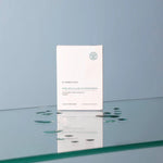 Cynobiota Molecular Hydrogen skincare product packaging on a reflective surface with a light blue background